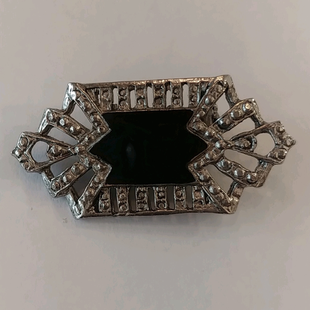 Silvertone and black acrylic Brooch